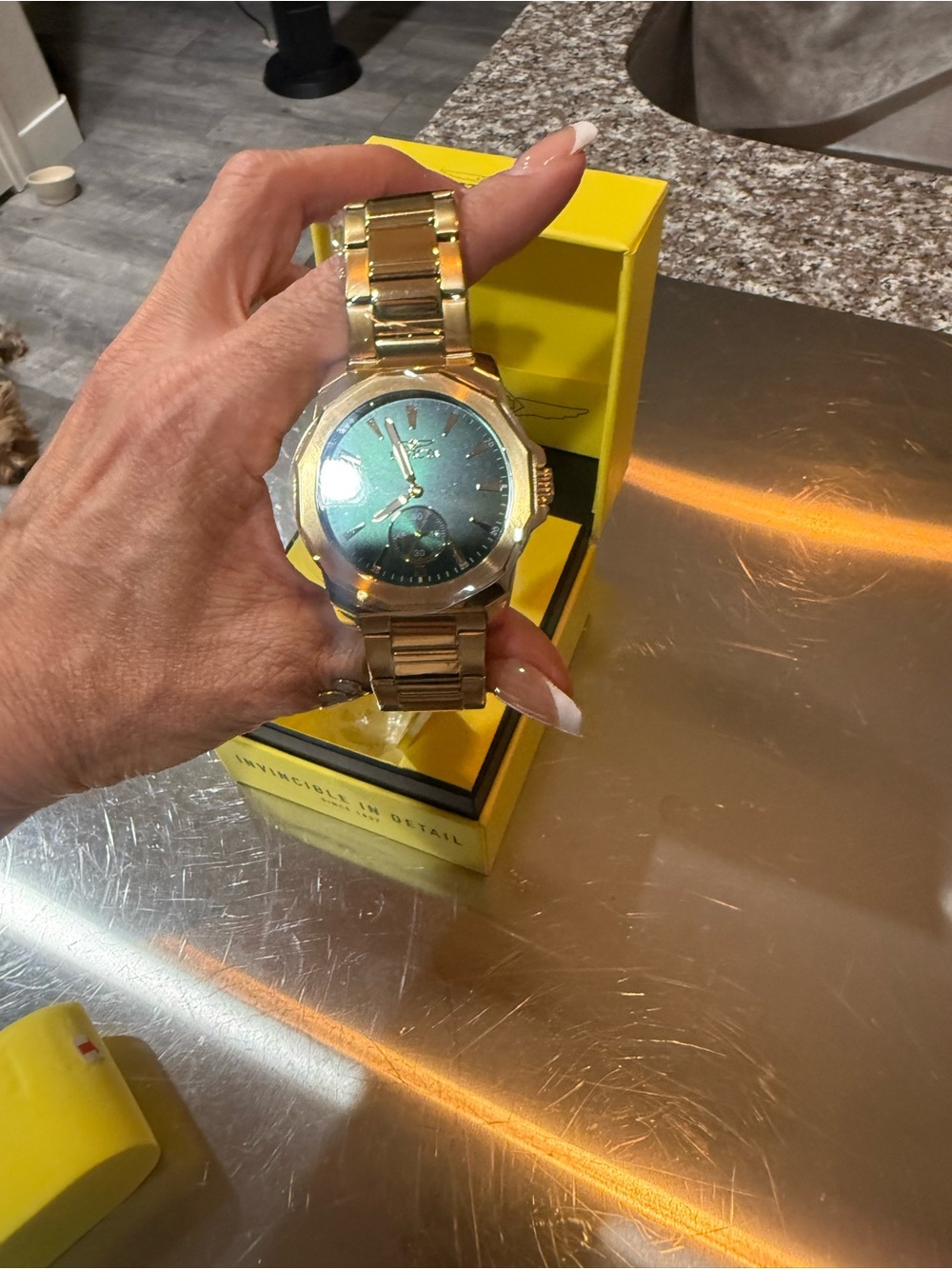 Invicta Gold Tone Watch with Blue-Green Dial
